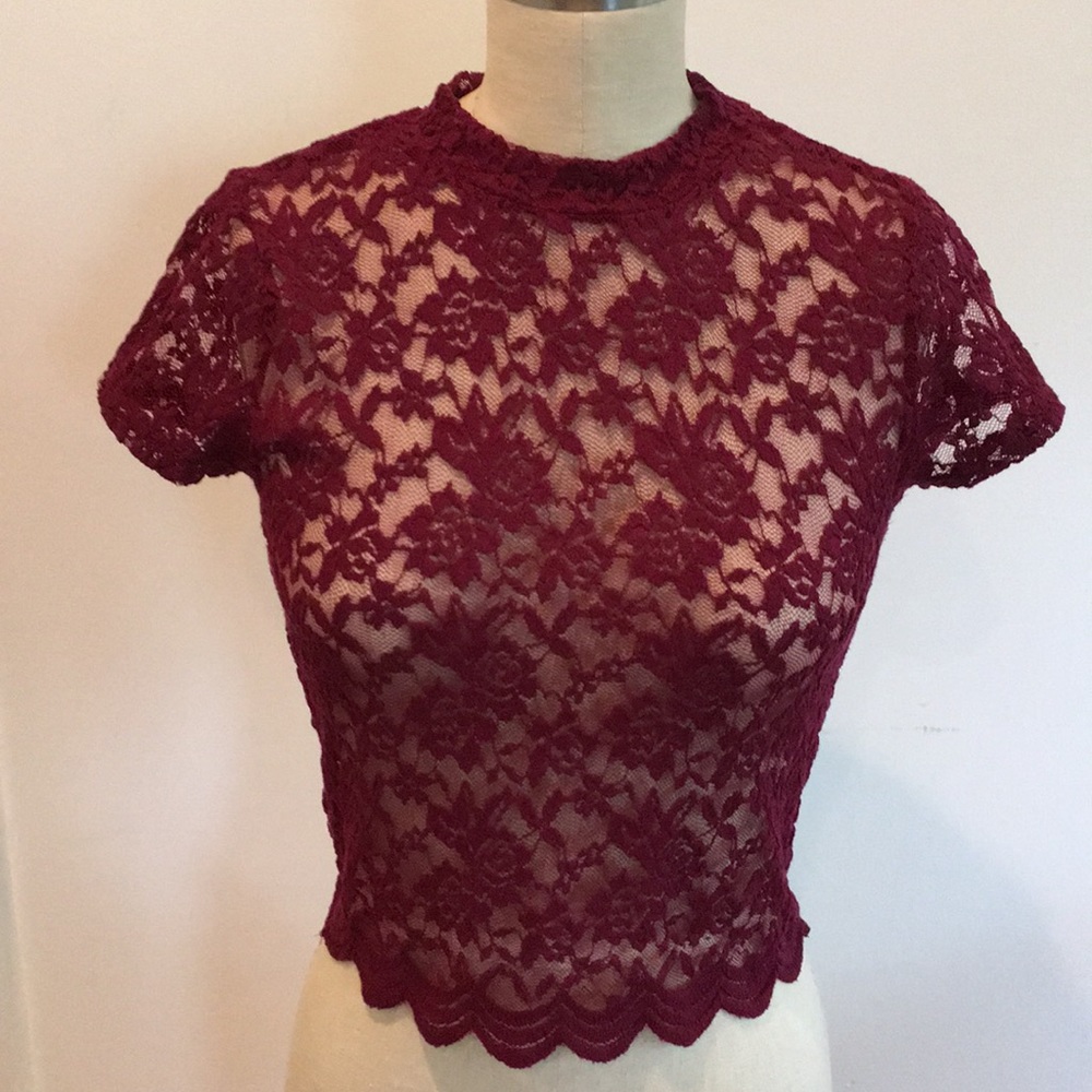 Cute burgundy stretch lace top with scallop hem